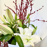 Christmas Lily Bouquet with Red Berries